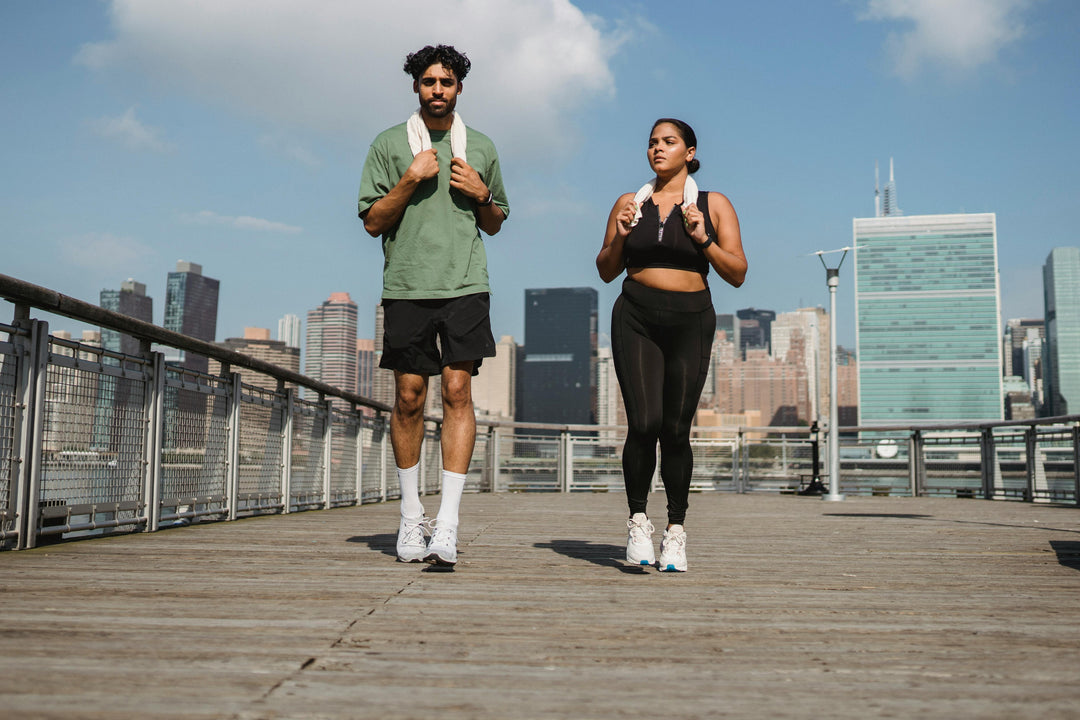 Man and woman on pier walking together 